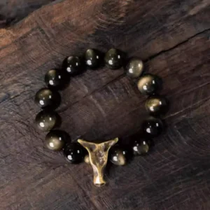 Volcanic obsidian protection bracelet with reclaimed brass spacers