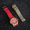 Zakiram Leather and Stainless-Steel Straps Close-up of the Royal Muse Zakiram red agate dial and circular Six-Syllable Mantra bezel engraving.